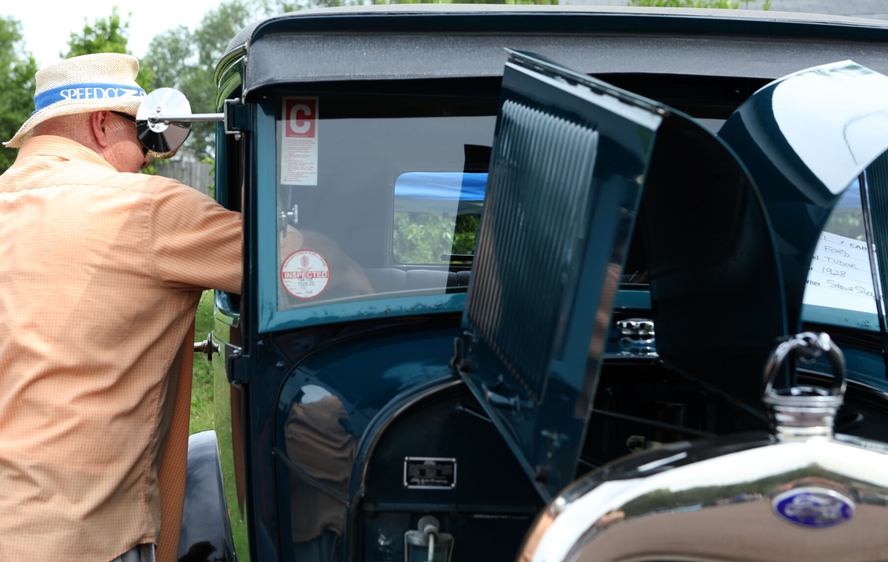 Steve Sleeper reaches into his car